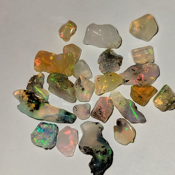 14ctw Natural Black/Blue Ethiopian Opal Polished Rough 4-9mm Grade A 15-30pcs. - Picture 2 of 3